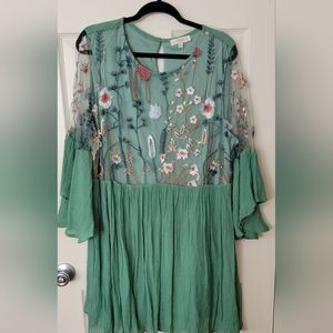 Beautiful UMGEE dress. Green with floral embellishments. Size 1XL